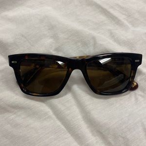 Oliver Peoples polarized sunglasses.